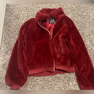 Red faux fur coat